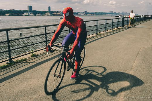 Even Spider-Man is embracing getting around the city on a bike.